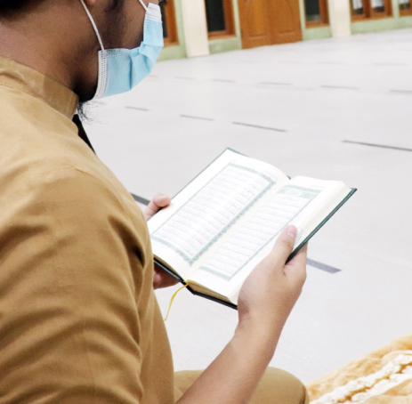 Student reading the Quran